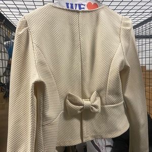 cream small women’s blazer and vegan leather jacket